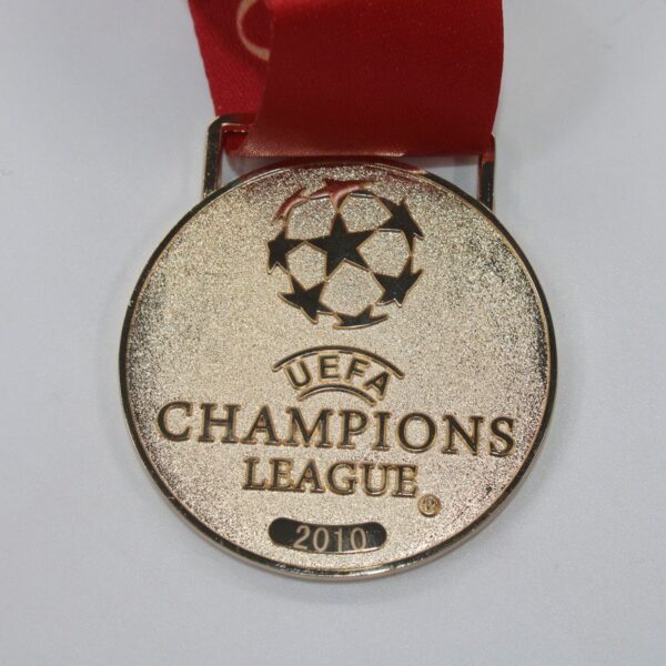 Medalla Final Champions League 09/10