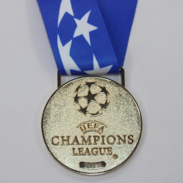 Medalla Final Champions League 13/14