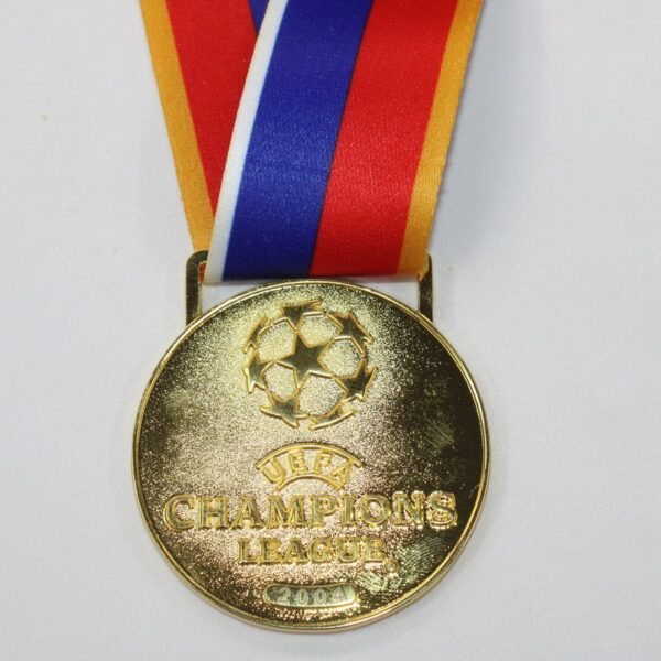 Medalla Final Champions League 03/04