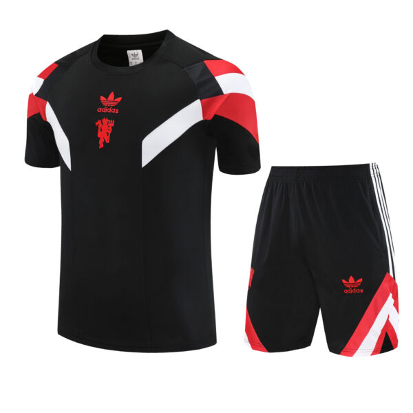 Conjunto de calentamiento Manchester United negro y rojo rayas