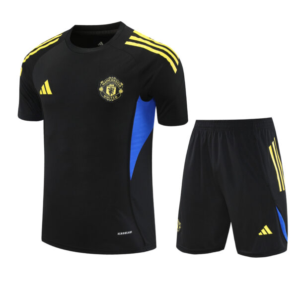 Conjunto de calentamiento Manchester United negro y amarillo