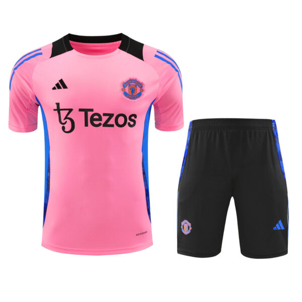 Conjunto de calentamiento Manchester United rosa