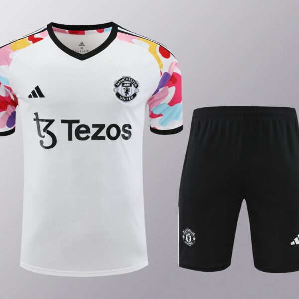 Conjunto de calentamiento Manchester United blanco mangas colores