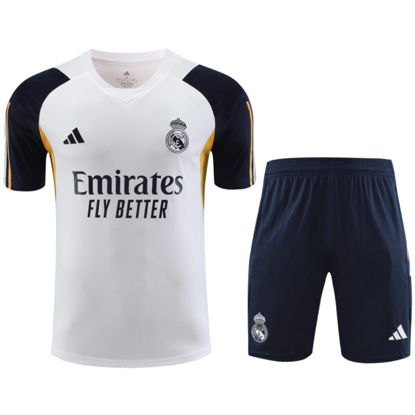 Conjunto de calentamiento Real Madrid blanco y naranja